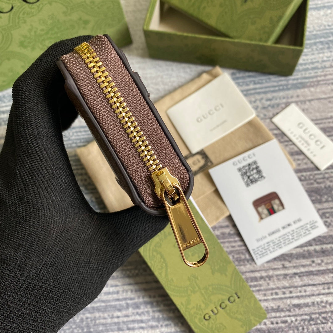 PORTEFEUILLE OPHIDIA GG 11 EN TOILE BEIGE ET ÉBÈNE