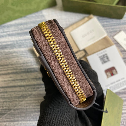 PORTEFEUILLE OPHIDIA GG 11 EN TOILE BEIGE ET ÉBÈNE