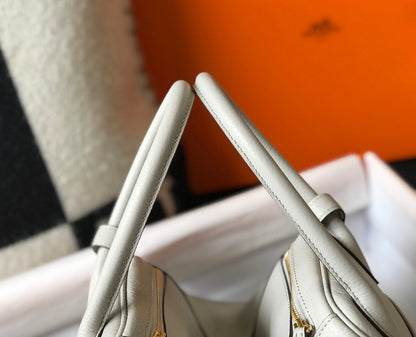 SAC HM LINDY 30 CUIR TAURILLON CLEMENCE CRÈME