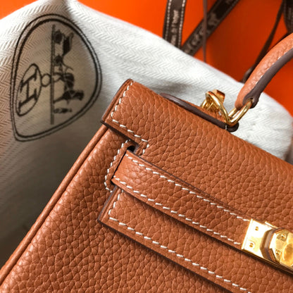 HM Mini Kelly 20 cm en cuir Togo doré et accessoires dorés
