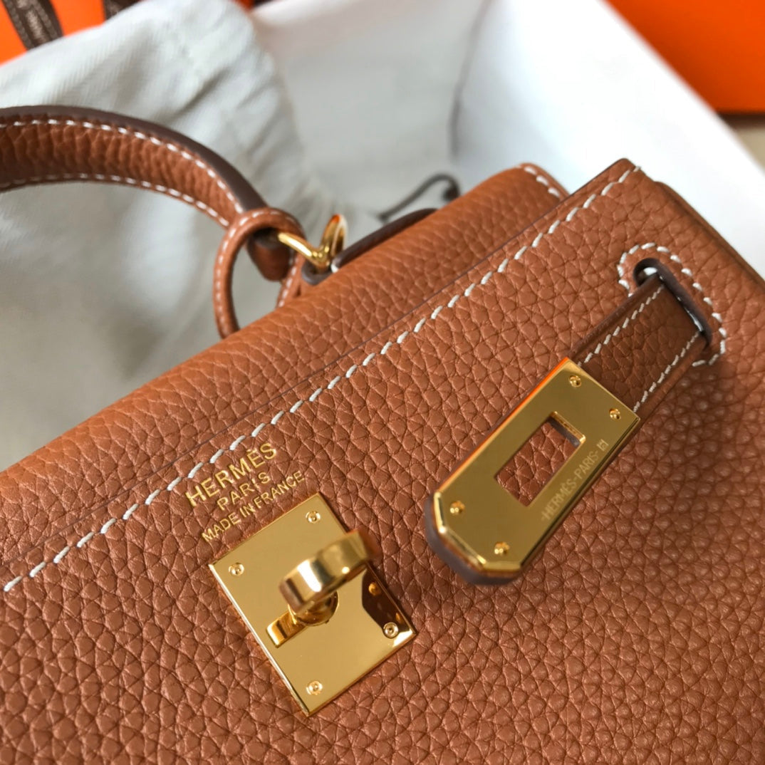 HM Mini Kelly 20 cm en cuir Togo doré et accessoires dorés