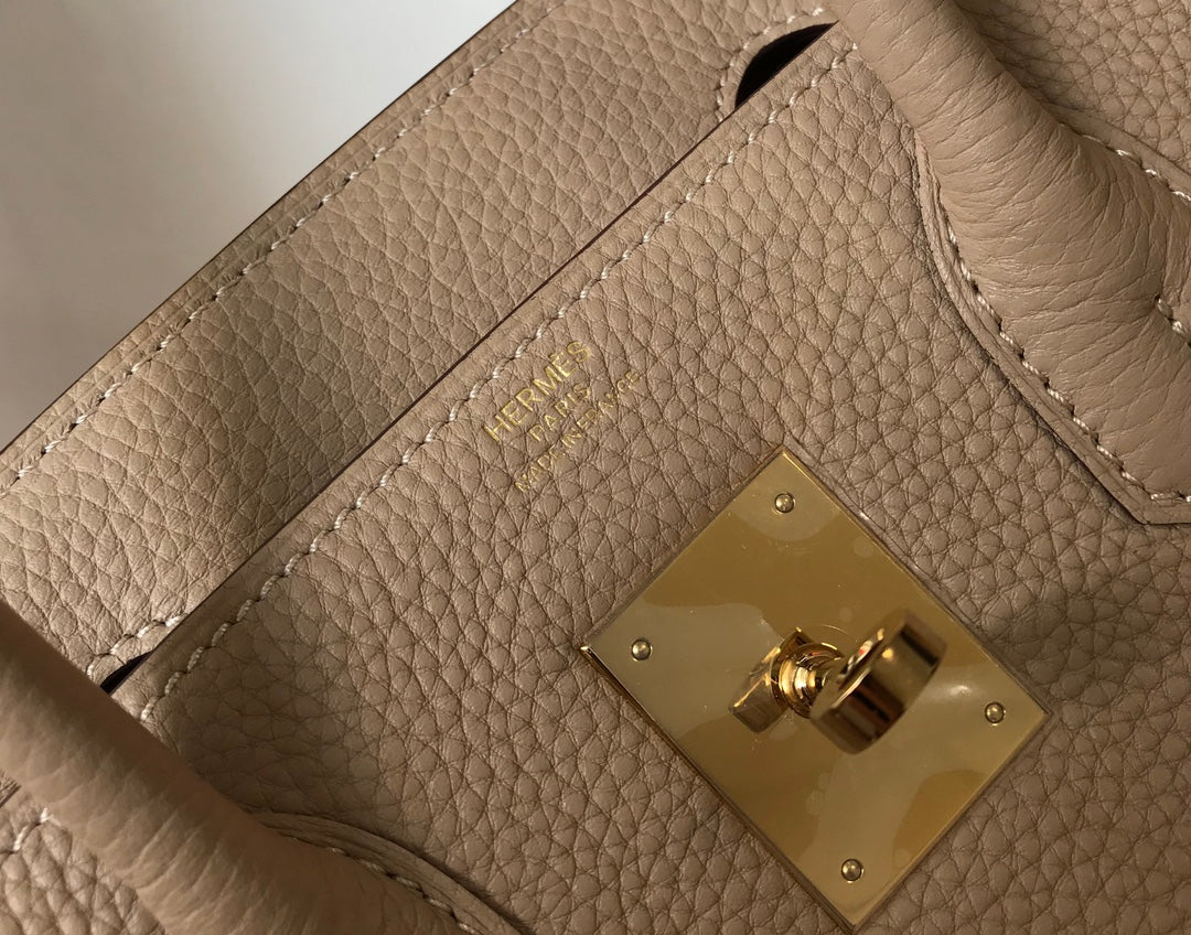 Sac HM Birkin 35 cm en cuir Togo beige et accessoires dorés