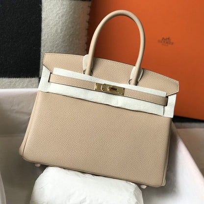 Sac HM Birkin 35 cm en cuir Togo beige et accessoires dorés