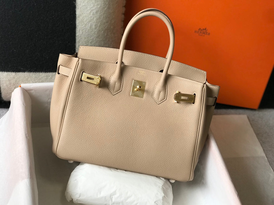 Sac HM Birkin 35 cm en cuir Togo beige et accessoires dorés