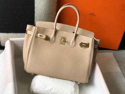 Sac HM Birkin 35 cm en cuir Togo beige et accessoires dorés