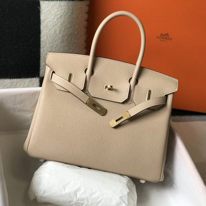 Sac HM Birkin 35 cm en cuir Togo beige et accessoires dorés