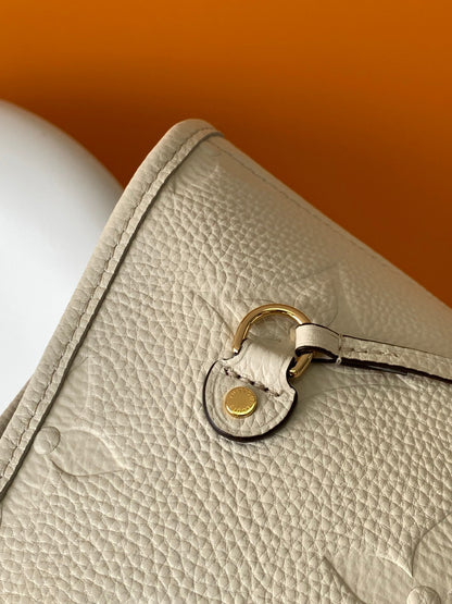 NEVERFULL MM 32 CUIR EMPREINTE MONOGRAMME BLANC 
