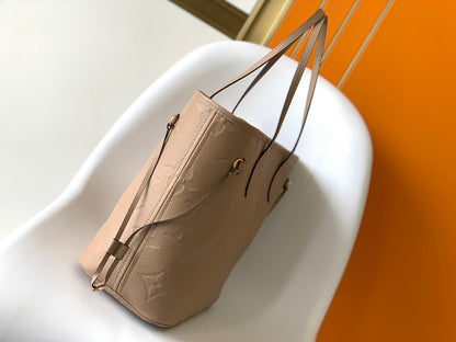 NEVERFULL MM 32 CUIR EMPREINTE MONOGRAMME BEIGE 