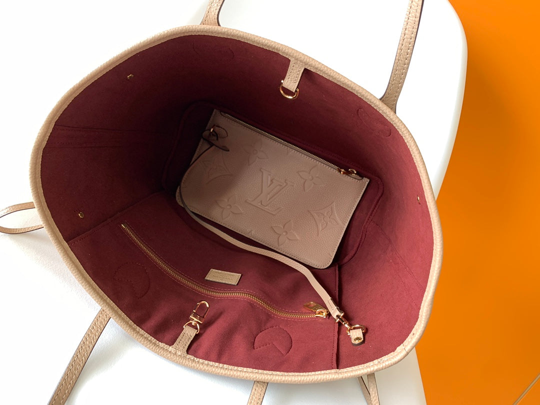 NEVERFULL MM 32 CUIR EMPREINTE MONOGRAMME BEIGE 