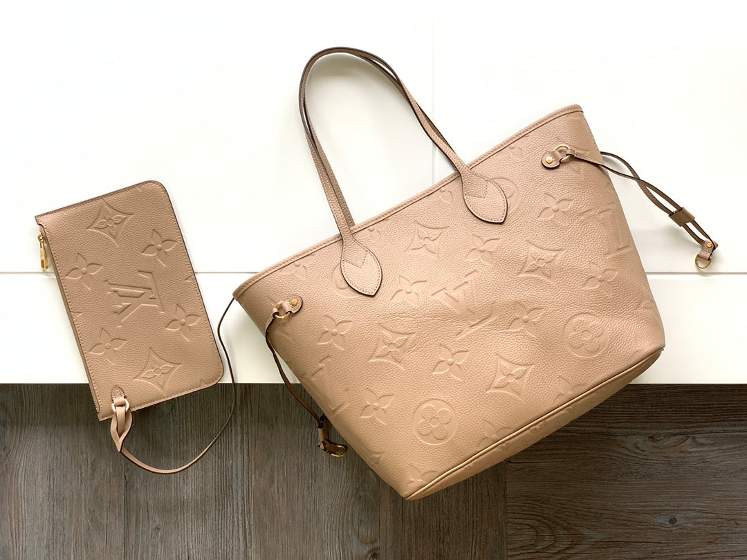 NEVERFULL MM 32 CUIR EMPREINTE MONOGRAMME BEIGE 