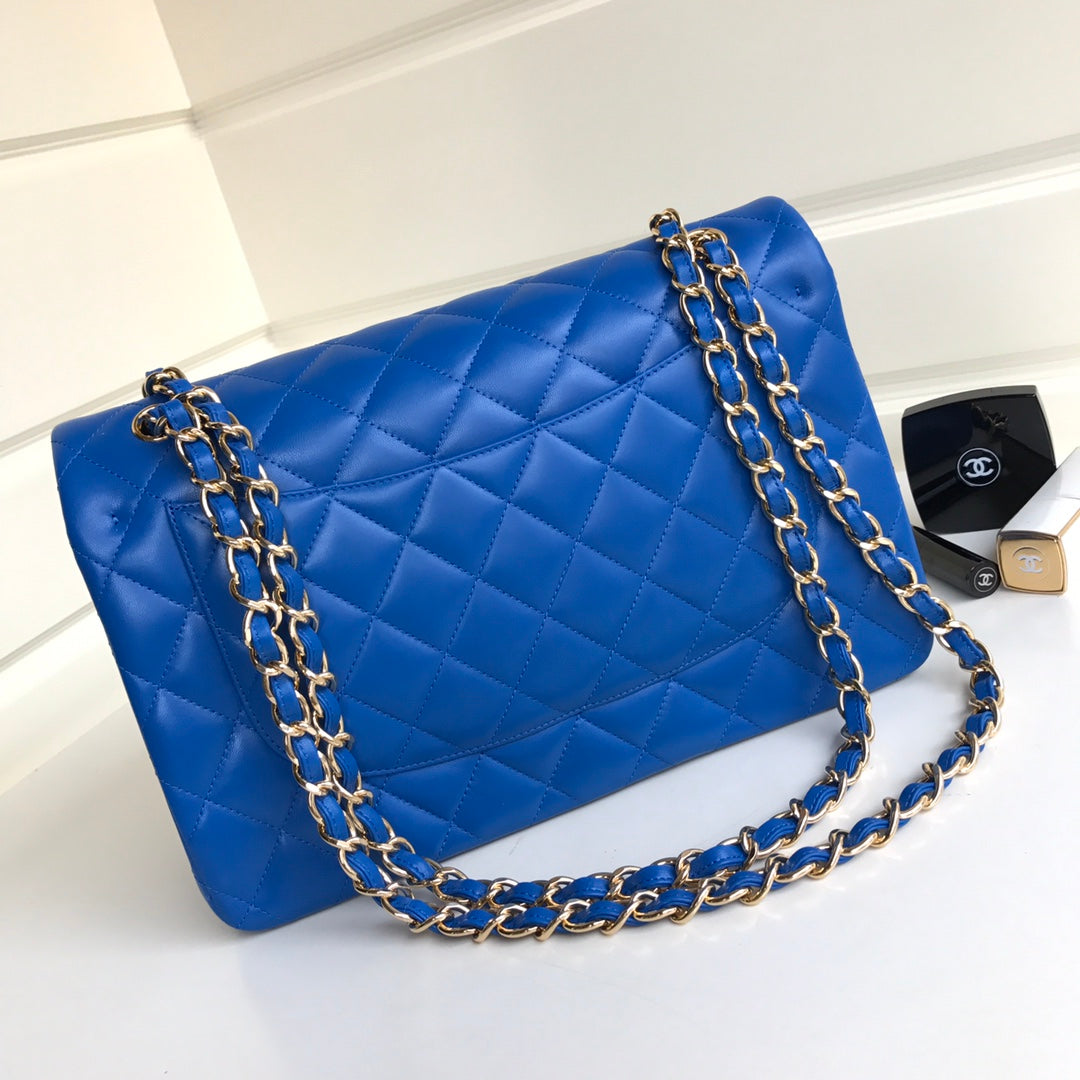 sac à rabat jumbo 30 en cuir d'agneau bleu et accessoires dorés