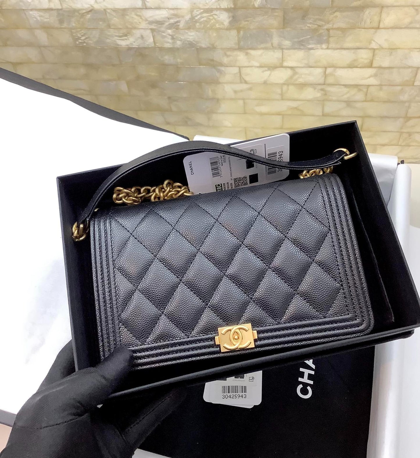 cc leboy woc 19cm noir matelassé caviar matériel doré
