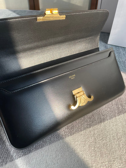 SAC À BANDOULIÈRE CHAÎNE CLAUDE 33 EN CUIR DE VEAU NOIR ET QUINCAILLERIE DORÉ