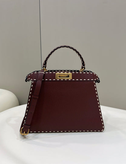 PEEKABOO ISEEU 33 IN SANGRIA RED GRAINED CALFSKIN GOLD HARDWARE