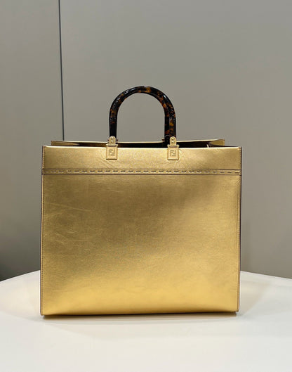 Grand sac cabas SHINE 35 en cuir de veau doré