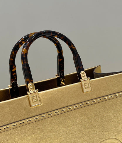 Grand sac cabas SHINE 35 en cuir de veau doré