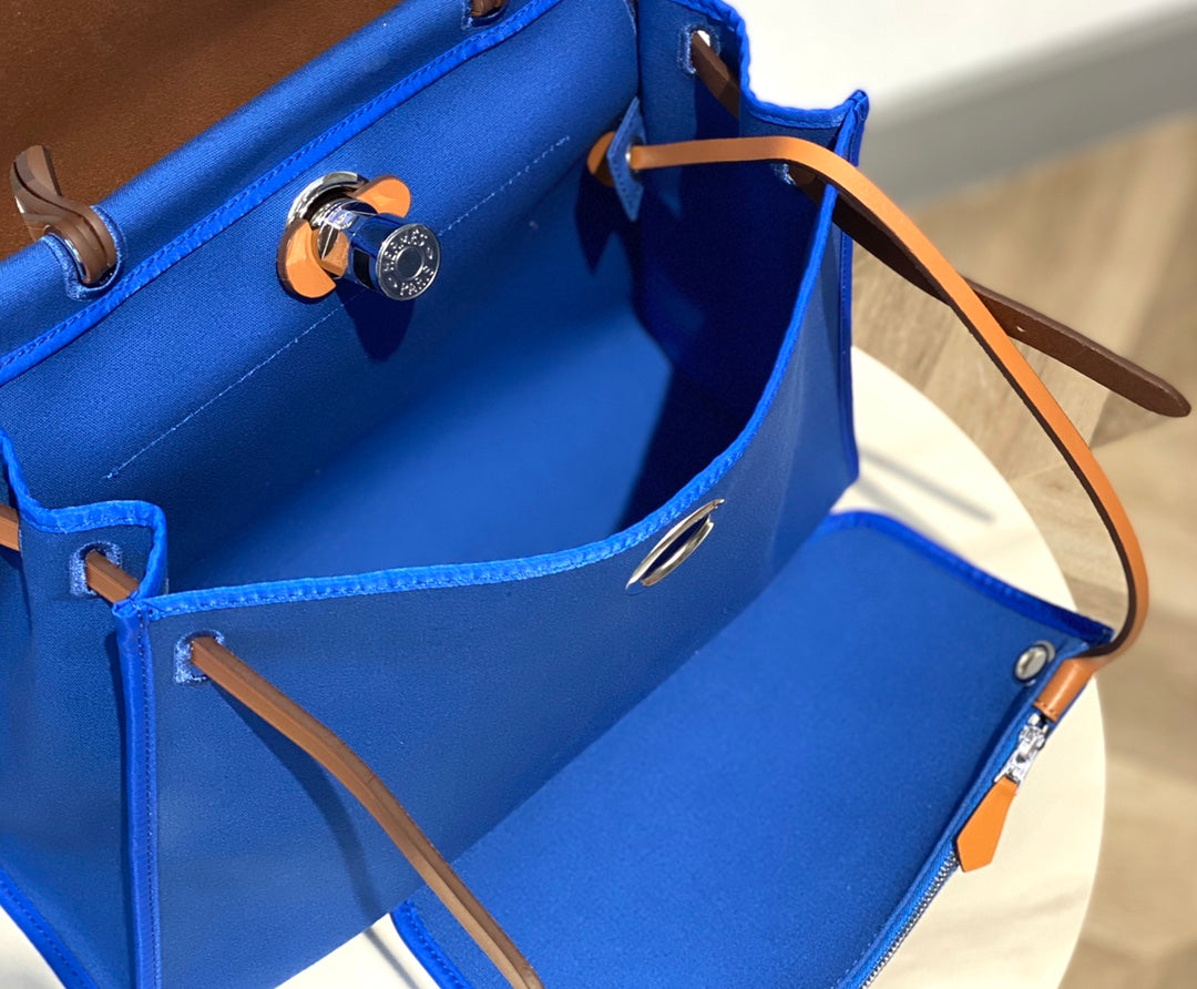 Herbag 31 Toile Bleu Toile Cuir de vachette doré