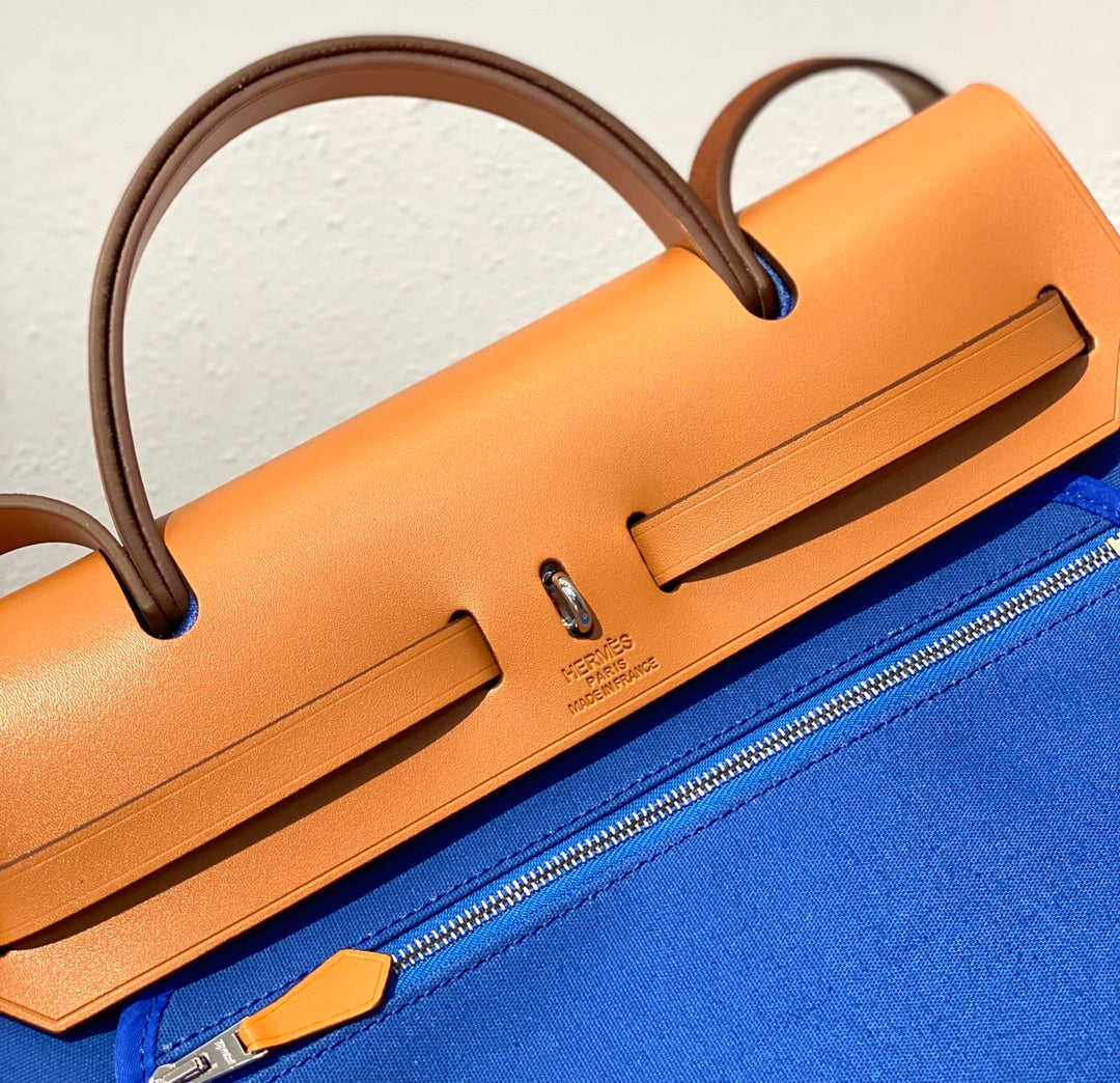 Herbag 31 Toile Bleu Toile Cuir de vachette doré