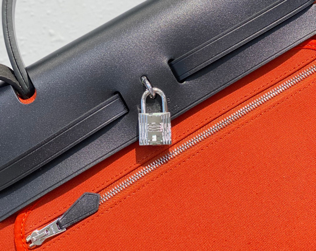 エルバッグ 31 トワル レッドオレンジ キャンバス ブラック 牛革