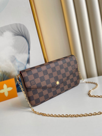 FÉLICIE POCHETTE 21 EN TOILE ENDUIT DAMIER EBENE MARRON QUINCAILLERIE OR