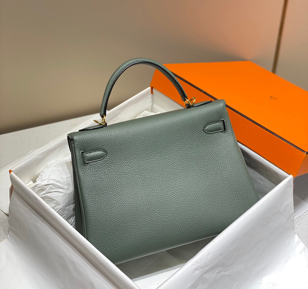 hm kelly 32 cm cuir togo vert amande accessoires dorés