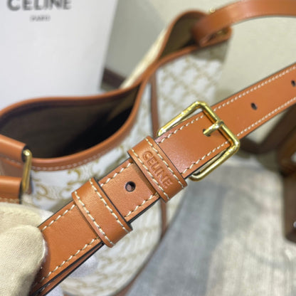 SEAU 33 EN TOILE TRIOMPHE BLANCHE ET GARNITURES EN CUIR DE VEAU MARRON BRONZE