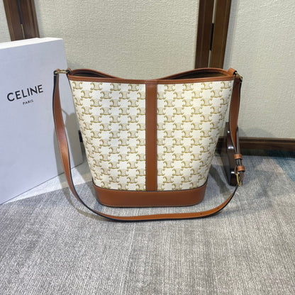 SEAU 33 EN TOILE TRIOMPHE BLANCHE ET GARNITURES EN CUIR DE VEAU MARRON BRONZE