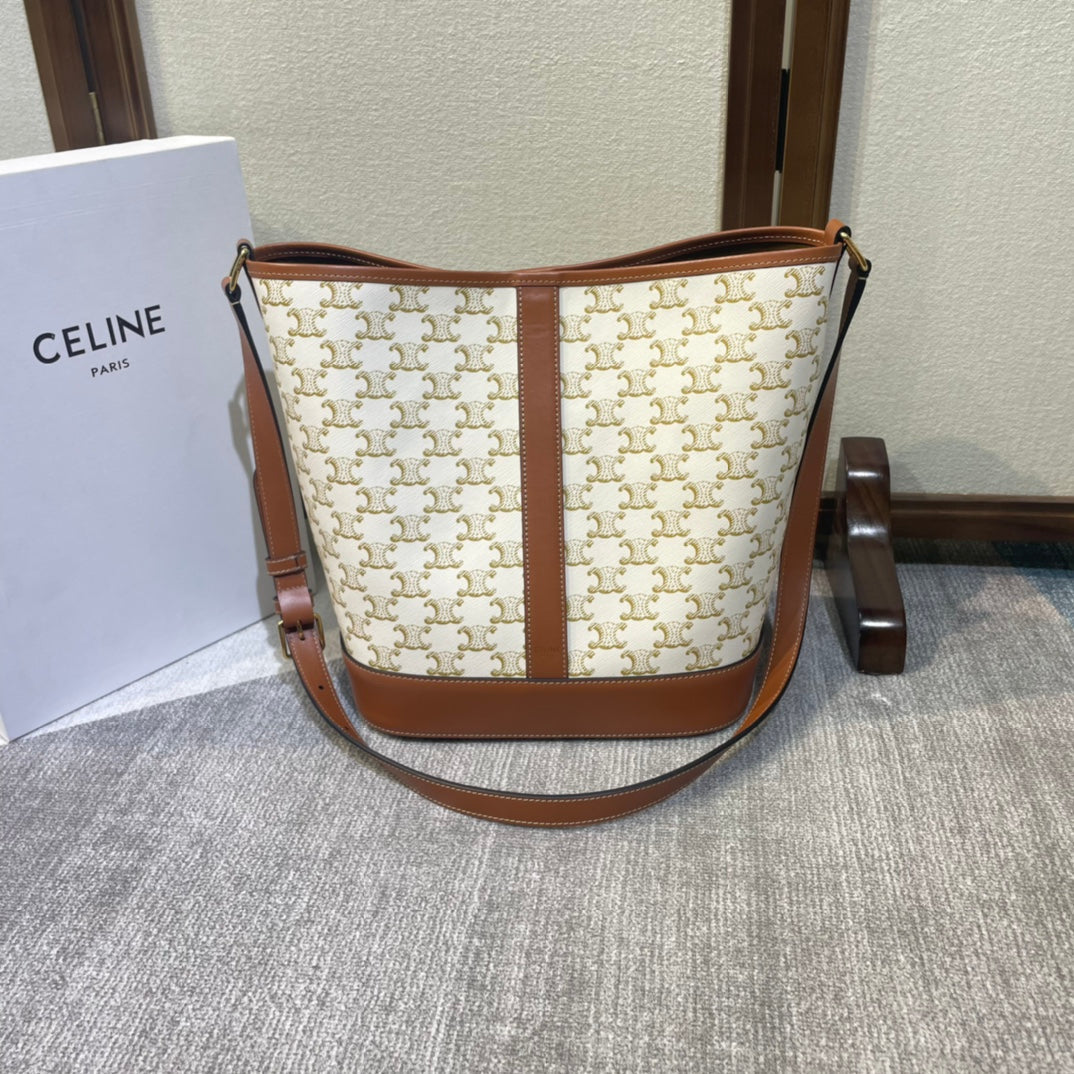 SEAU 33 EN TOILE TRIOMPHE BLANCHE ET GARNITURES EN CUIR DE VEAU MARRON BRONZE