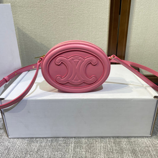SAC À MAIN OVALE 16 EN CUIR DE VEAU ROUGE ROSE