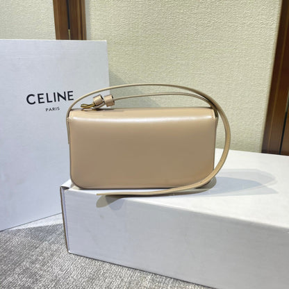 Triomphe classique 20 en cuir de veau beige clair avec finitions dorées