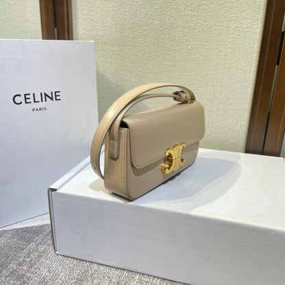 Triomphe classique 20 en cuir de veau beige clair avec finitions dorées