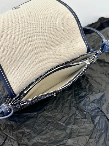 Portefeuille de poche Plumet 20 en toile Goyardine bleu marine et garniture en cuir d'agneau
