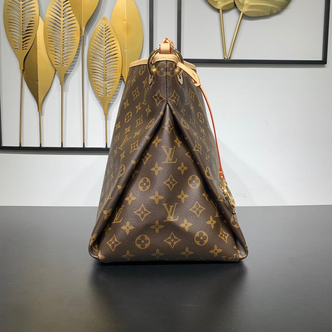 ARTSY MM 41 EN TOILE MONOGRAMME MARRON QUINCAILLERIE DORÉ