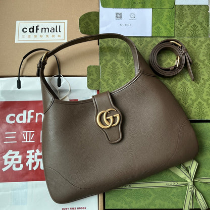 SAC À BANDOULIÈRE MOYEN 39 EN CUIR DE VEAU CAFÉ QUINCAILLERIE DORÉ