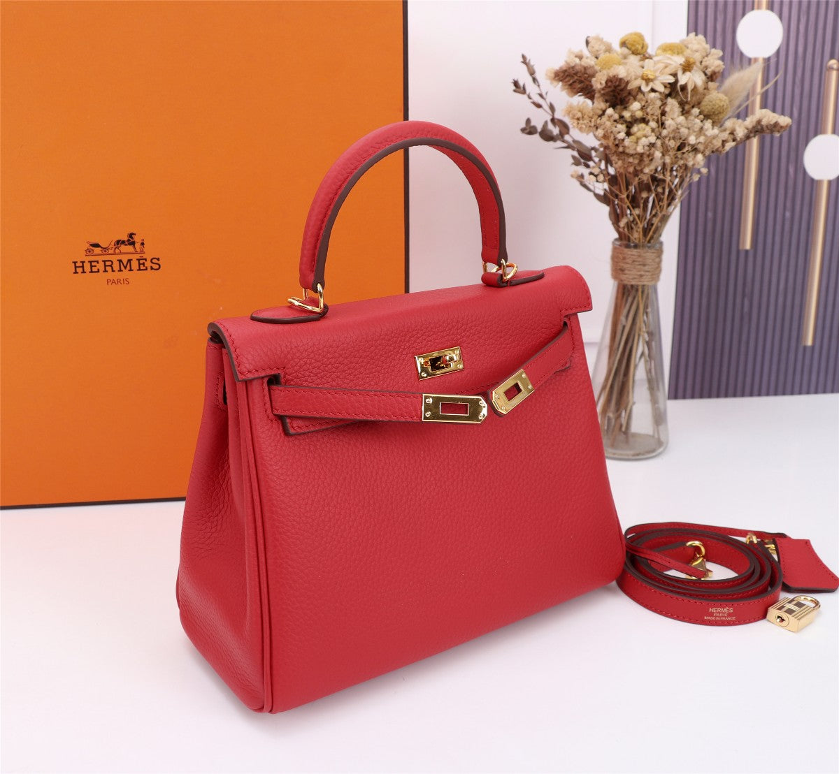 SAC HM KELLY 25 ROUGE TOGO QUINCAILLERIE OR