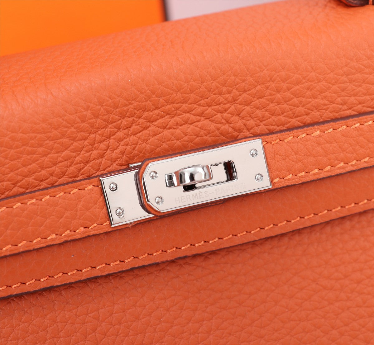 SAC HM KELLY 28 ORANGE TOGO QUINCAILLERIE ARGENTÉE