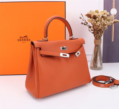 SAC HM KELLY 25 ORANGE TOGO QUINCAILLERIE ARGENTÉE