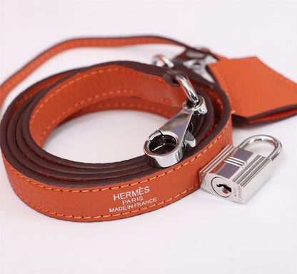 SAC HM KELLY 28 ORANGE TOGO QUINCAILLERIE ARGENTÉE