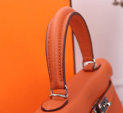 SAC HM KELLY 25 ORANGE TOGO QUINCAILLERIE ARGENTÉE