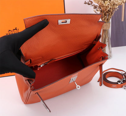 SAC HM KELLY 28 ORANGE TOGO QUINCAILLERIE ARGENTÉE