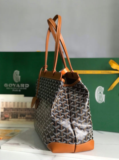 SAC BELLECHASSE BIAUDE PM 36 EN TOILE GOYARDINE NOIRE ET GARNITURES EN CUIR DE VEAU BRUN
