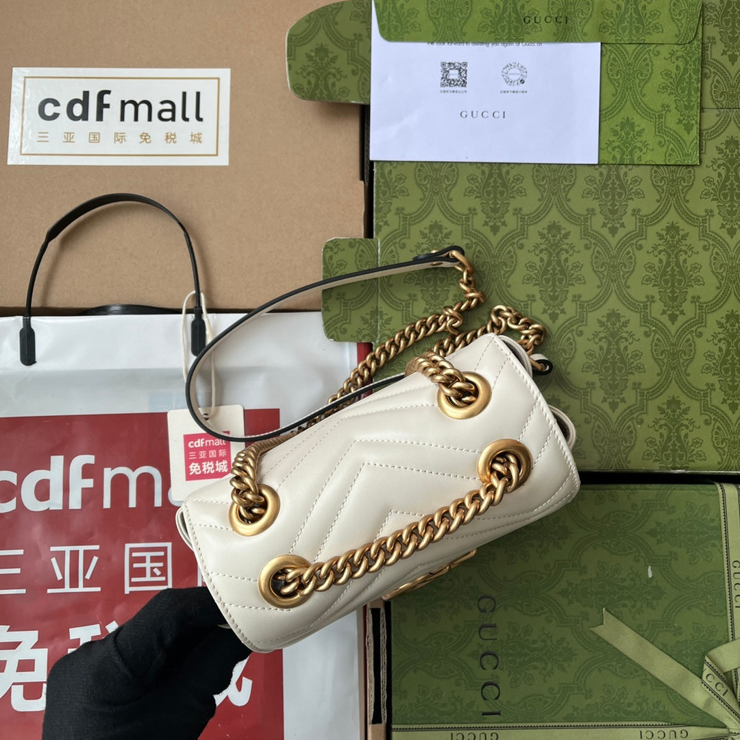 gg marmont mini 18 cm en cuir de veau blanc avec finitions dorées