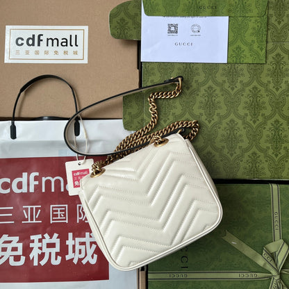 gg marmont mini 18 cm en cuir de veau blanc avec finitions dorées