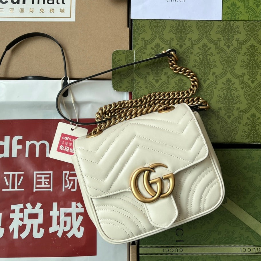 gg marmont mini 18 cm en cuir de veau blanc avec finitions dorées