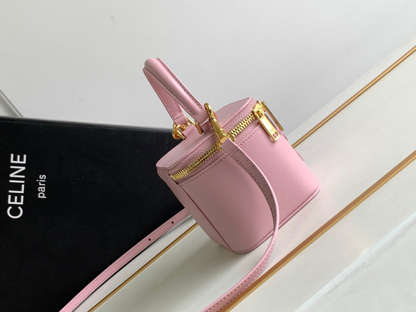 MINI TROUSSE DE VANITY TRIOMPHE EN CUIR DE VEAU ROSE