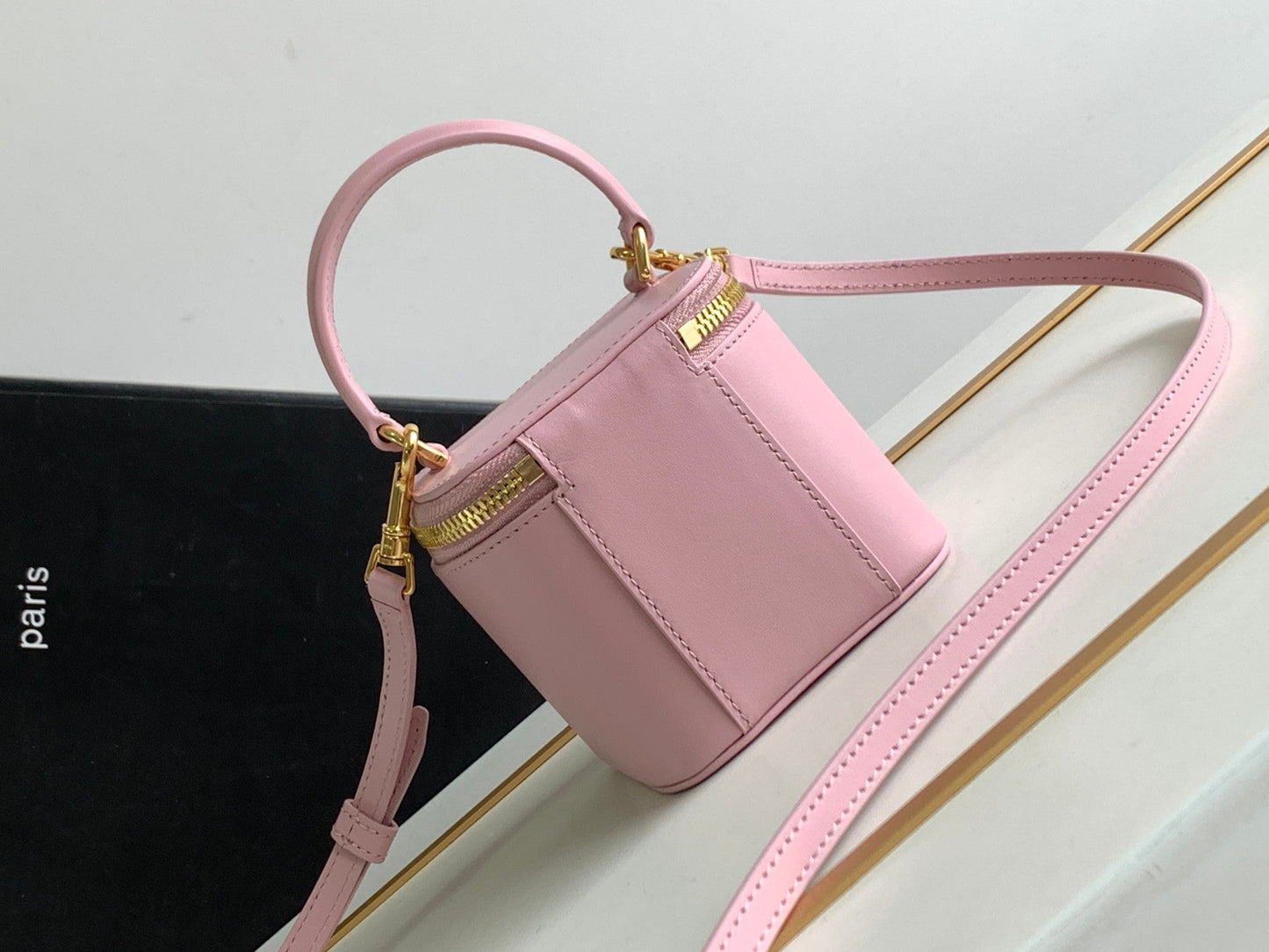 MINI TROUSSE DE VANITY TRIOMPHE EN CUIR DE VEAU ROSE