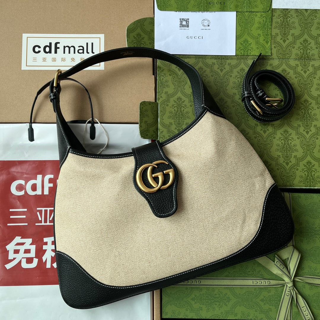 SAC APHRODITE MOYEN 39 EN TOILE BEIGE ET CUIR DE VEAU NOIR, QUINCAILLERIE DORÉ
