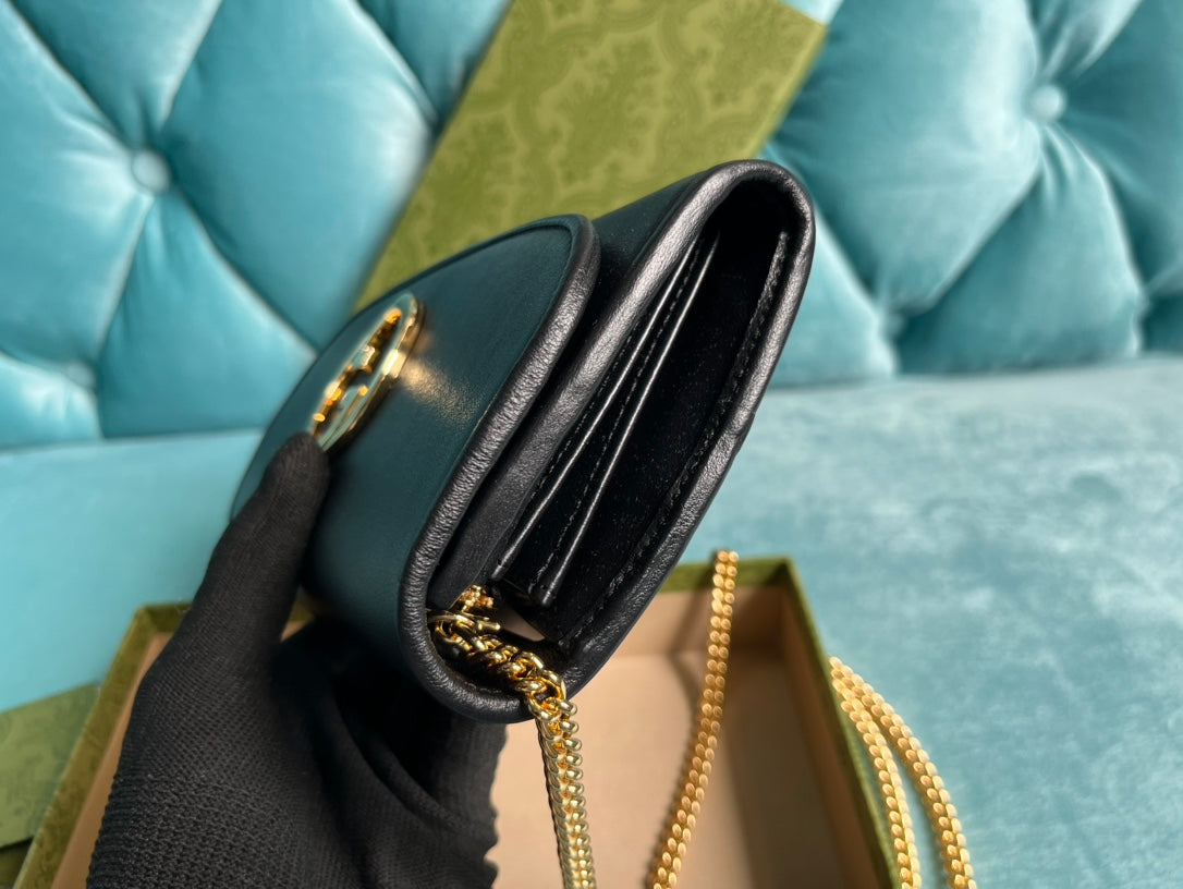 SAC BANDOULIÈRE BLONDIE 21 EN CUIR DE VEAU NOIR ET QUINCAILLERIE DORÉ