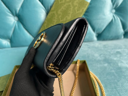 SAC BANDOULIÈRE BLONDIE 21 EN CUIR DE VEAU NOIR ET QUINCAILLERIE DORÉ