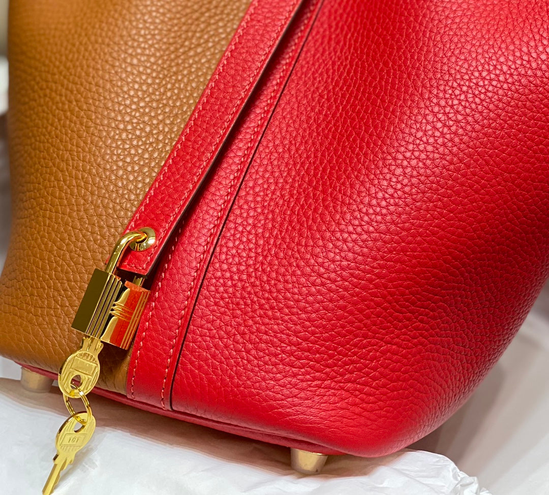Picotin Lock 18 rouge marron Togo SHW